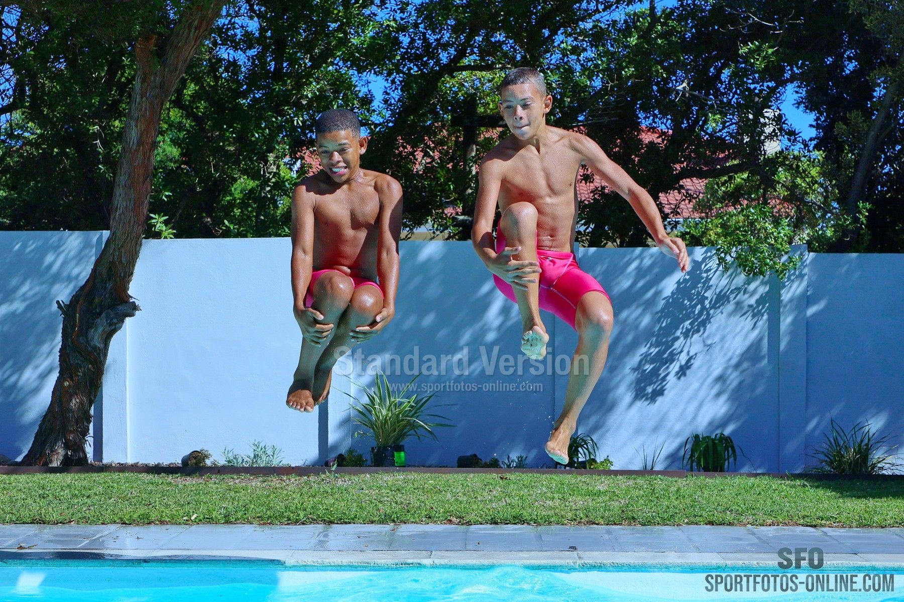 Sergio and Noah. Two boys at the pool.